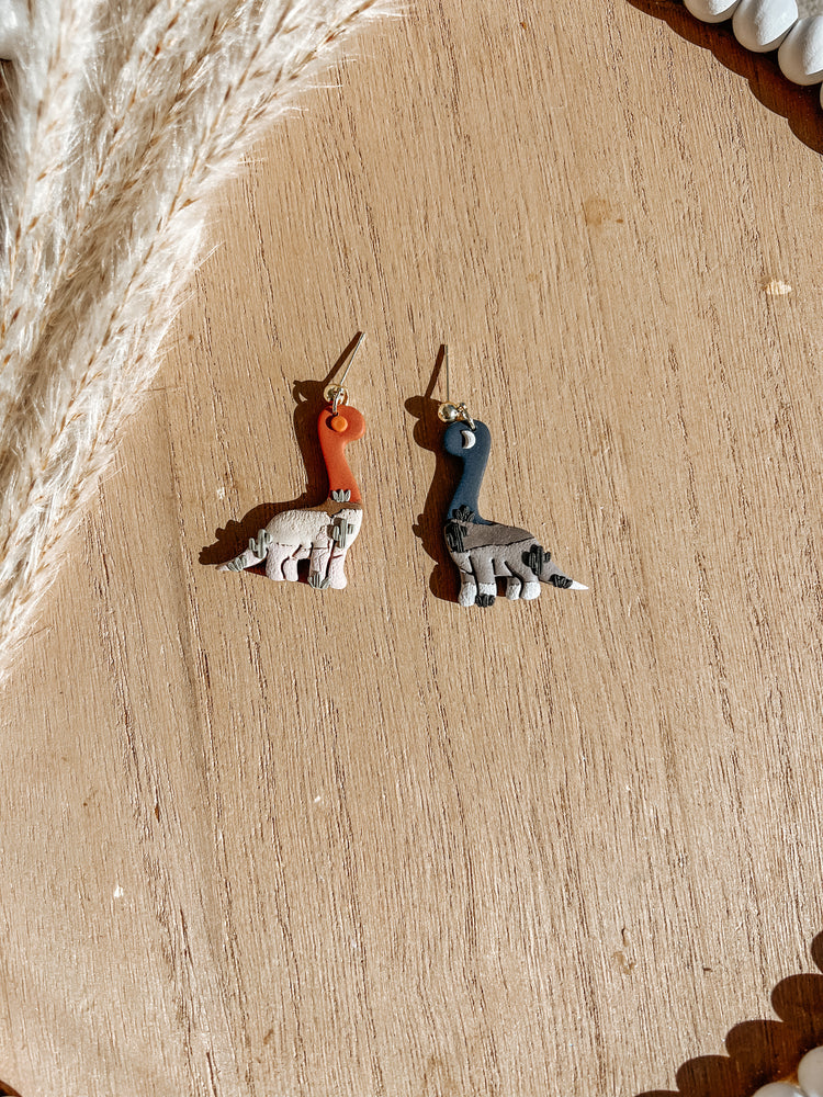 Day & Night Western Dinosaur Earrings
