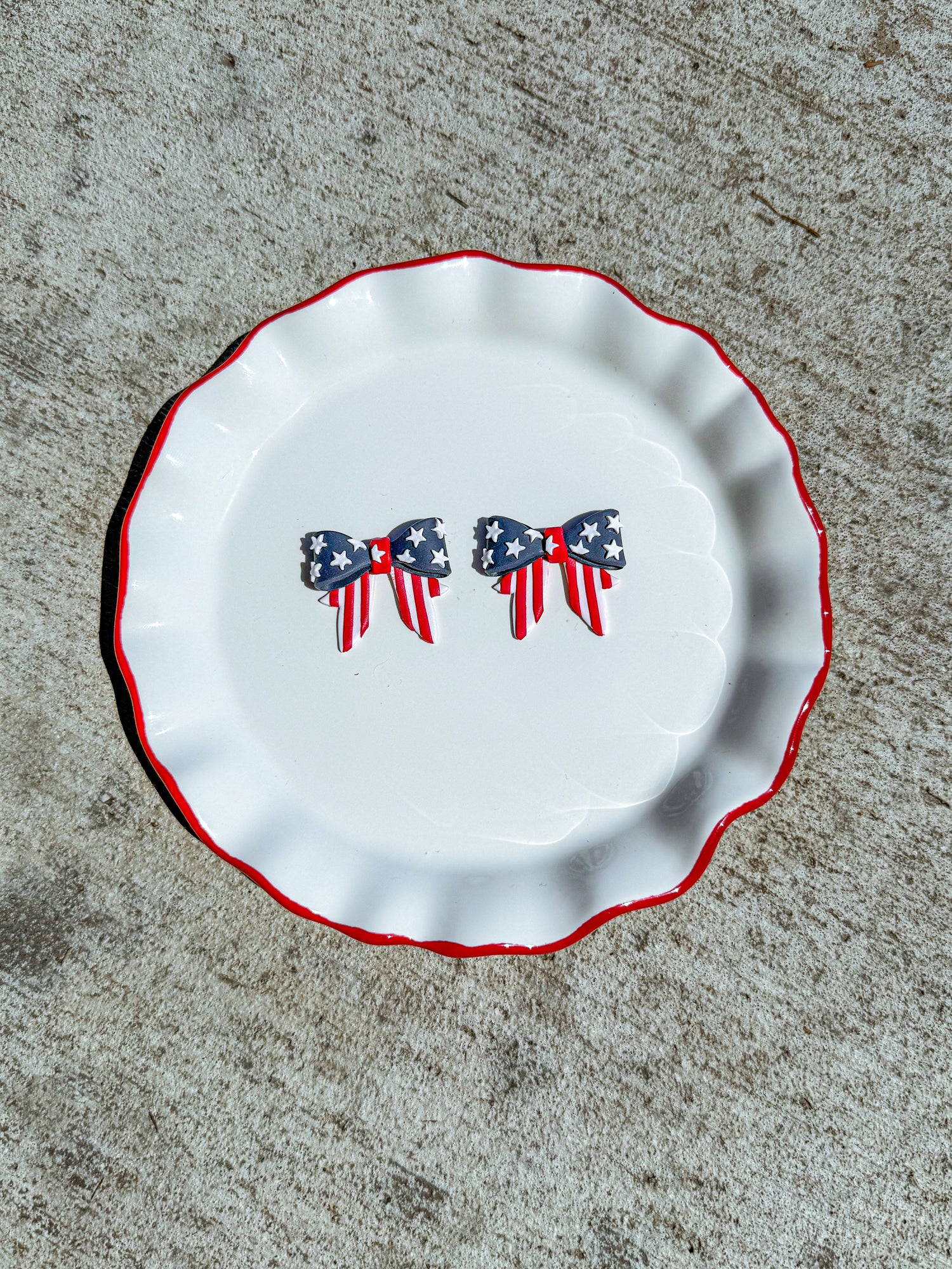 Flag printed bow clay earrings