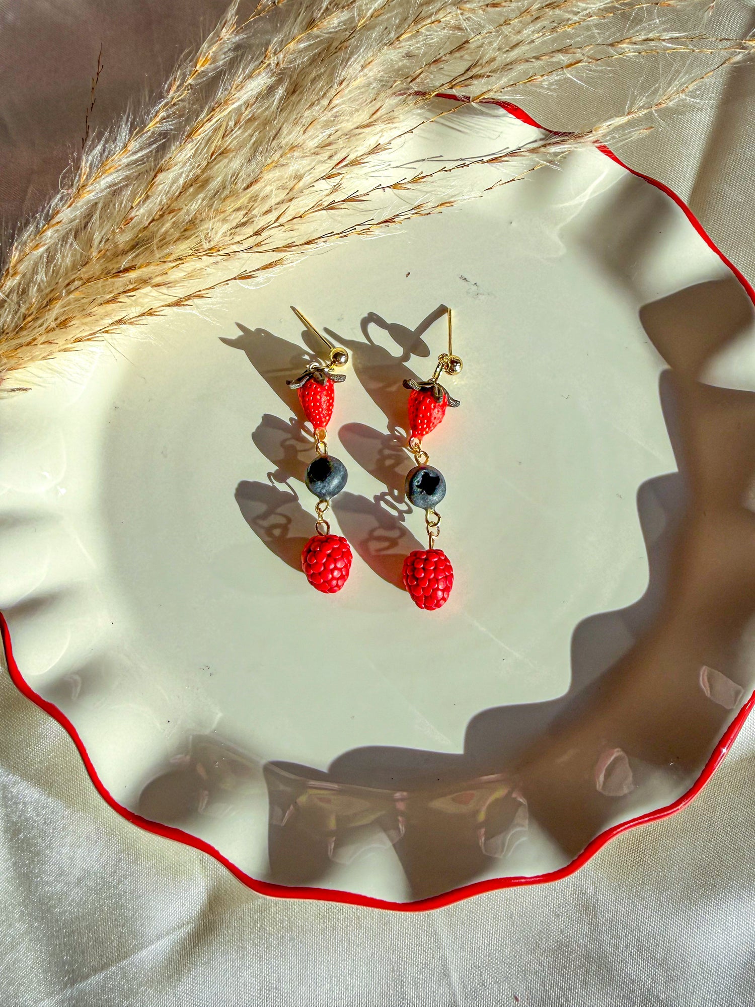 Pair of stawberry, blueberry and raspberry earrings dangling with gold filled ball earring post