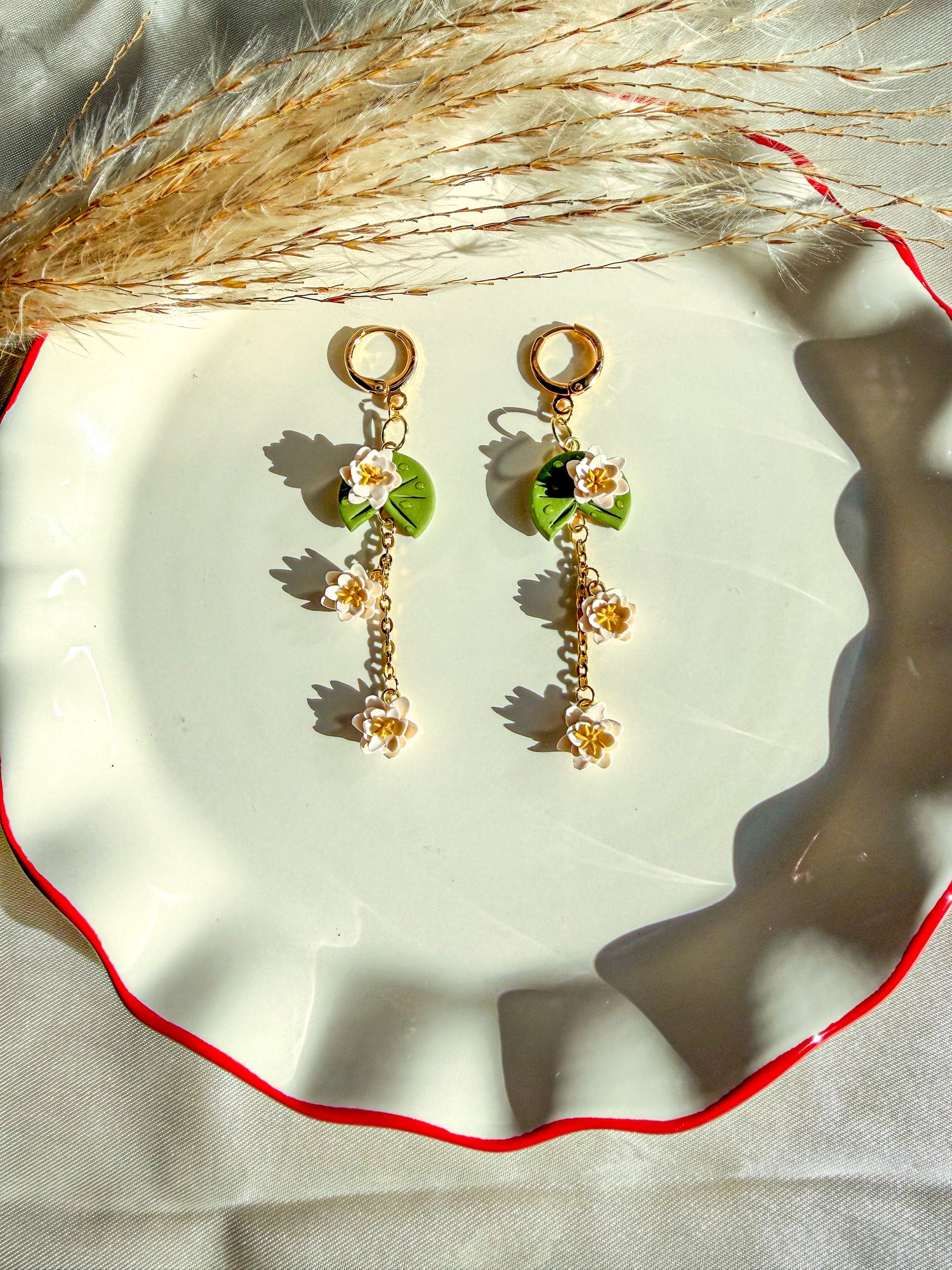 handmade lily pad flower earrings with white blossom flowers dangle earrings
