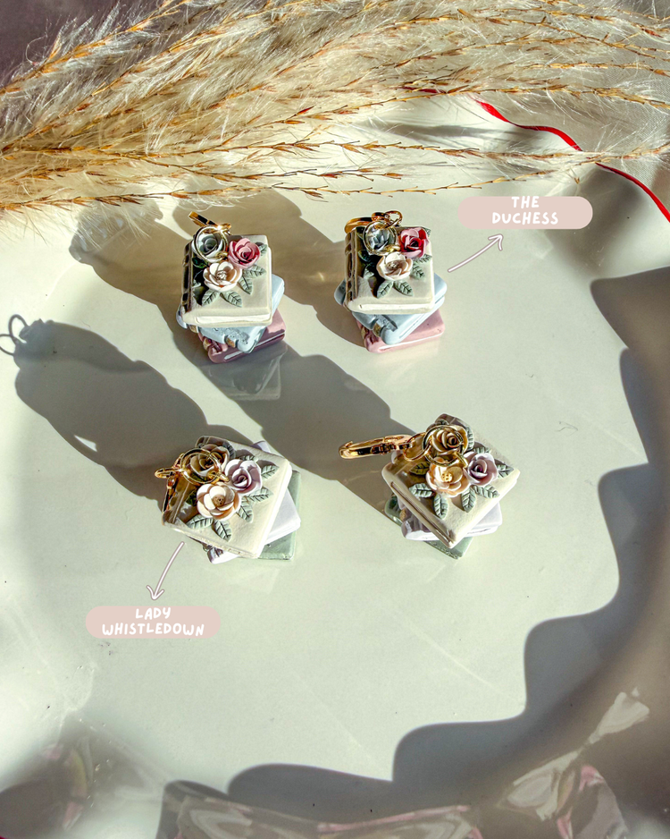 neutral spring color flowers on stacked book earrings