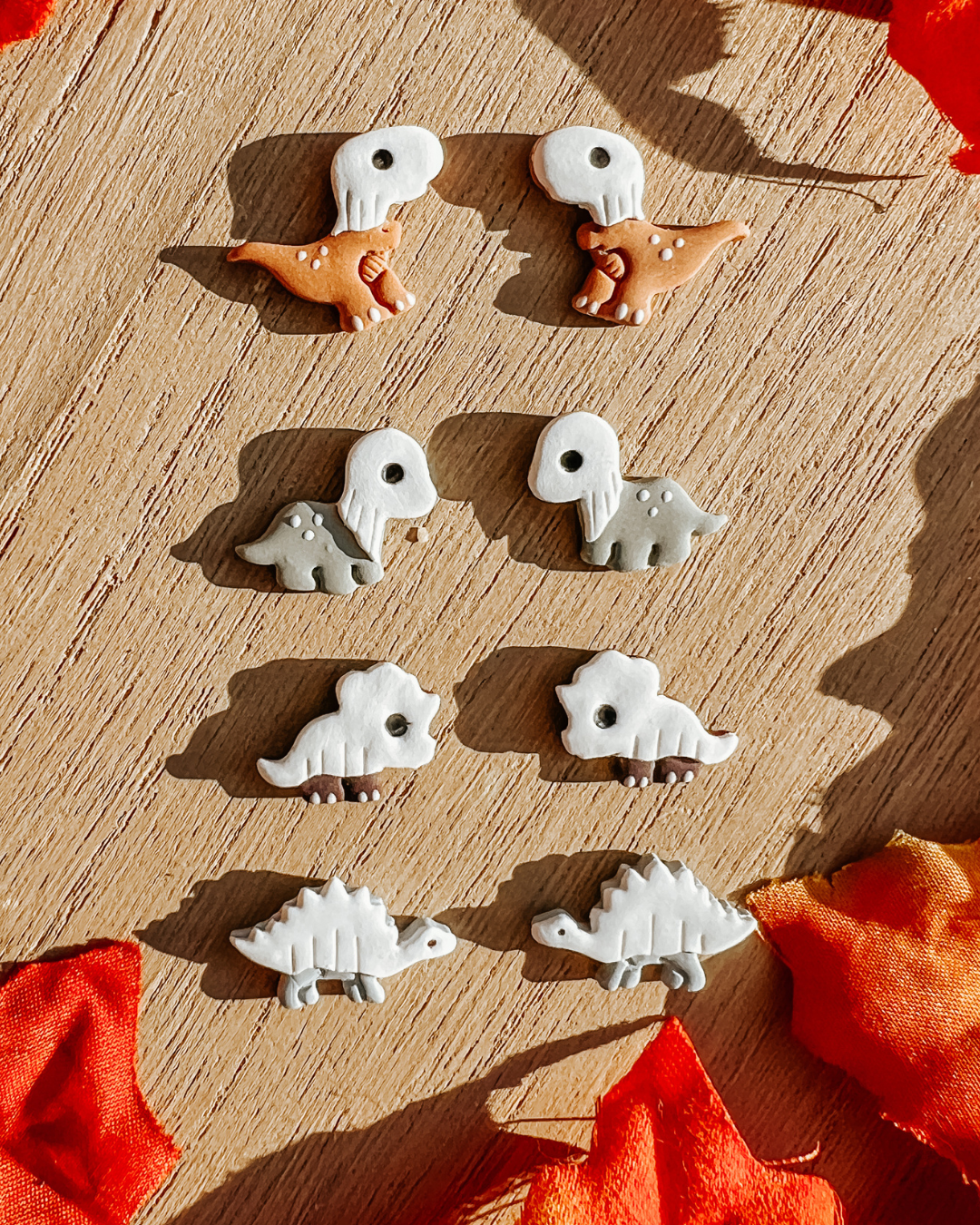 Polymer clay ghost dinosaur stud earrings