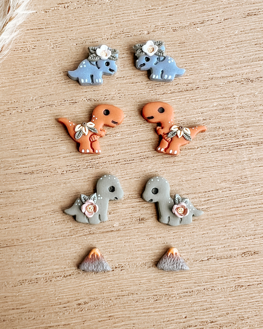 colorful dinosaur stud earrings with flowers 